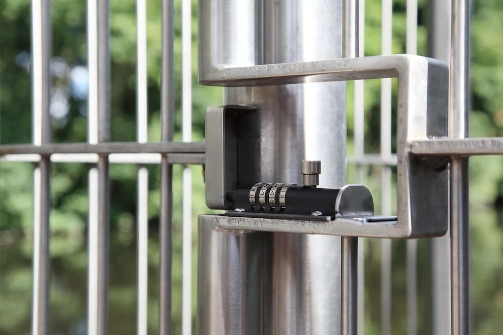 Stainless steel gate latch with a combination lock on the riverside gates