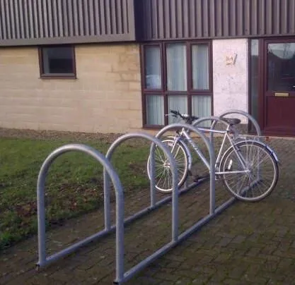 Galvanised steel toast-rack cycle stand with bicycles