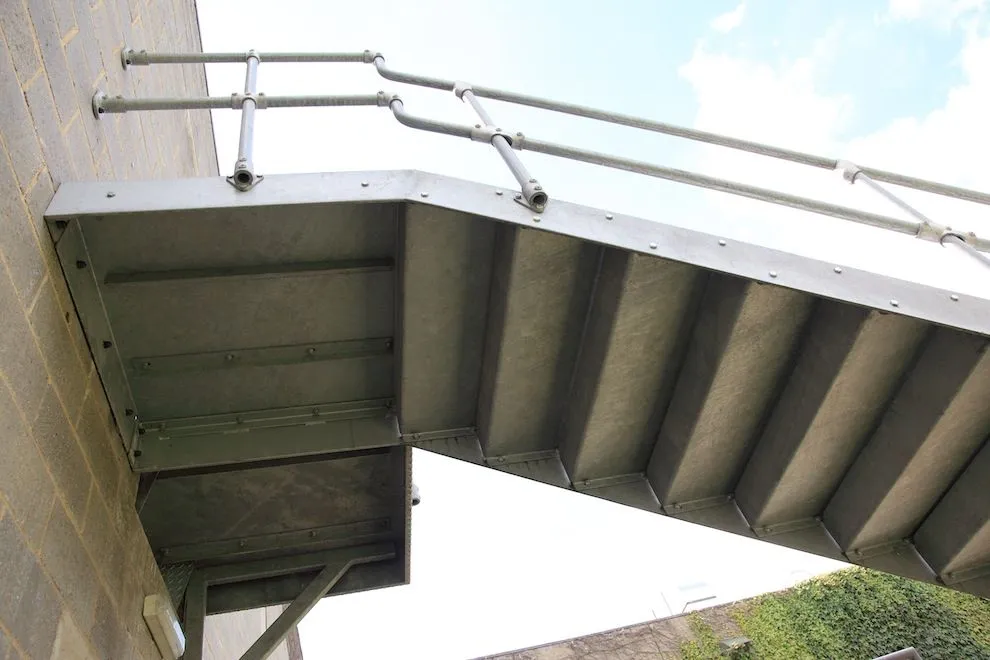 Underside of a galvanised steel staircase and landing