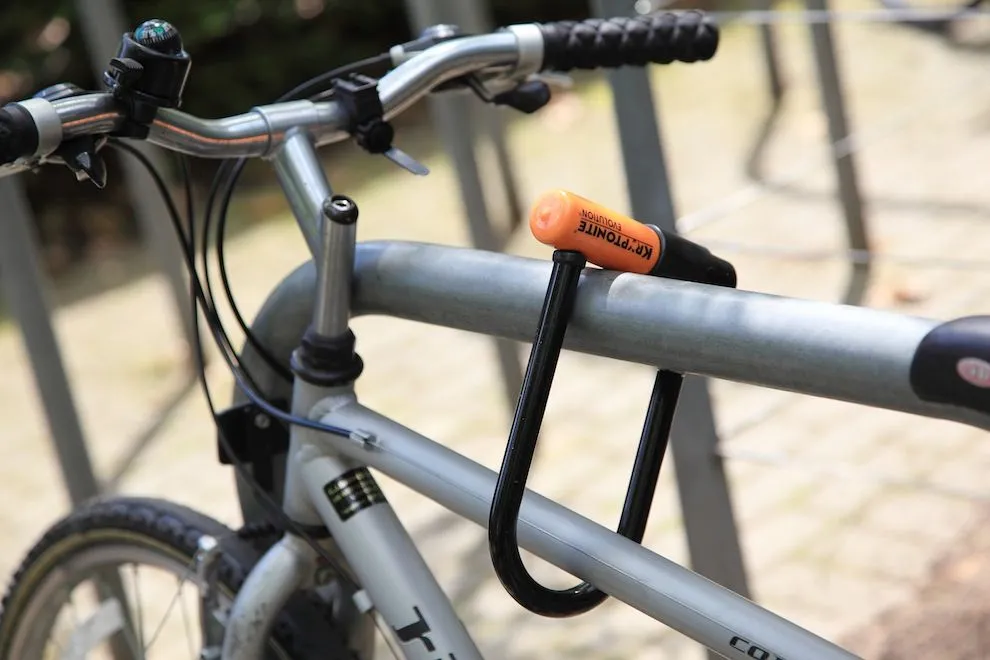 Bicycle locked to a galvanised steel cycle stand